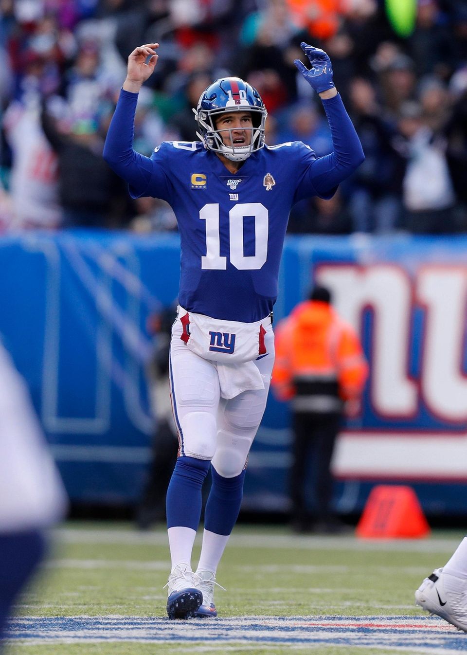 Eli Manning of the Giants celebrates after throwing