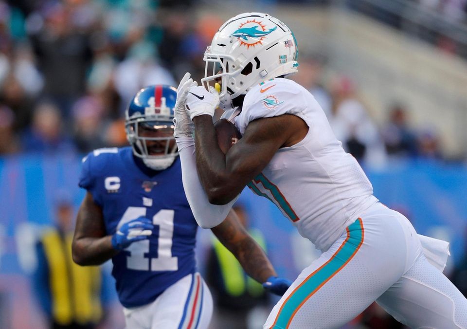 DeVante Parker #11 of the Miami Dolphins hauls