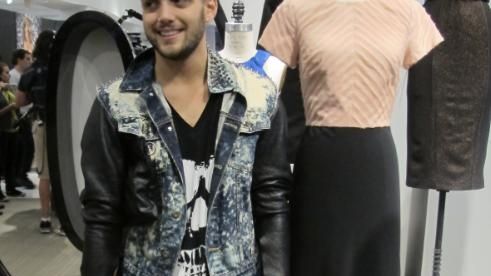 Massapequa designer Christopher Palu poses with his