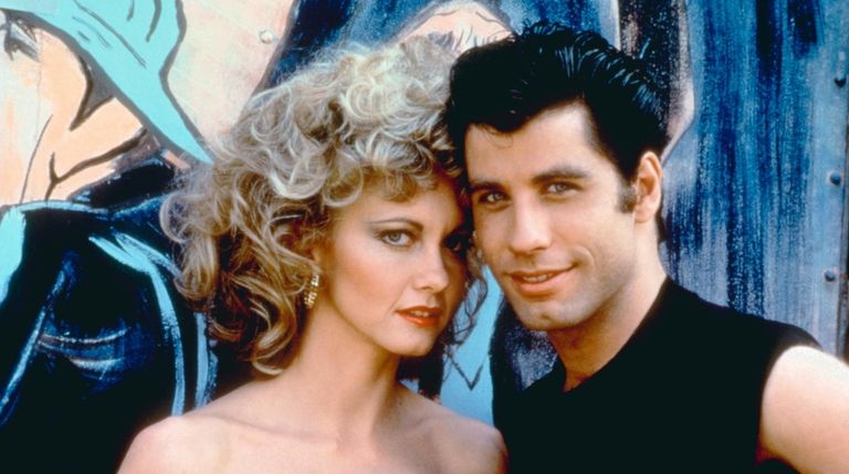 Olivia Newton-John as Sandy and John Travolta as