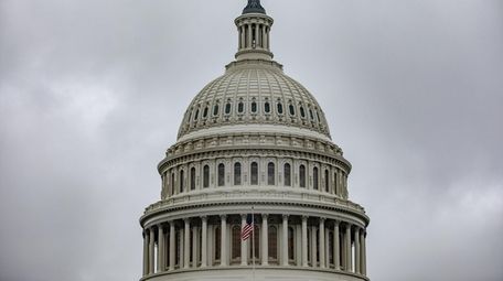 An overcast sky hangs above the U.S. Capitol