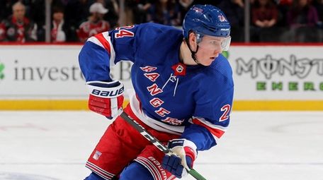 Kaapo Kakko of the Rangers skates with the