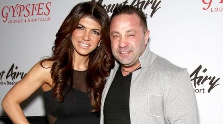 Teresa and Joe Giudice attend a book signing