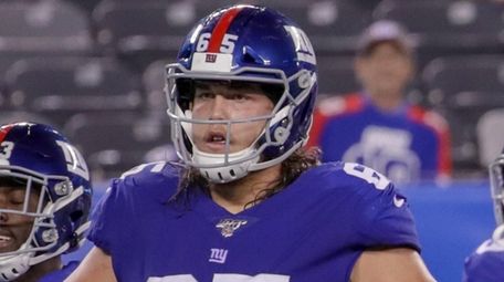 Giants offensive guard Nick Gates lines up during