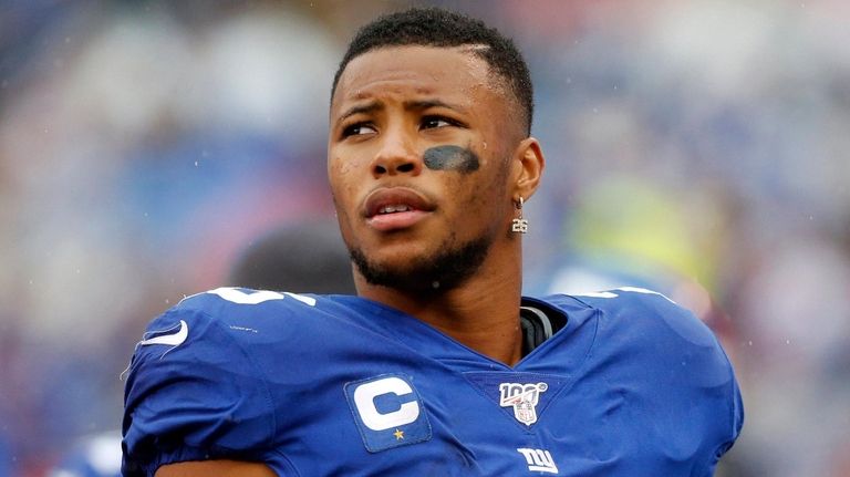 Saquon Barkley #26 of the Giants looks on