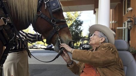 Opal Hagerty, 95, of Escondido meets Blossom, a