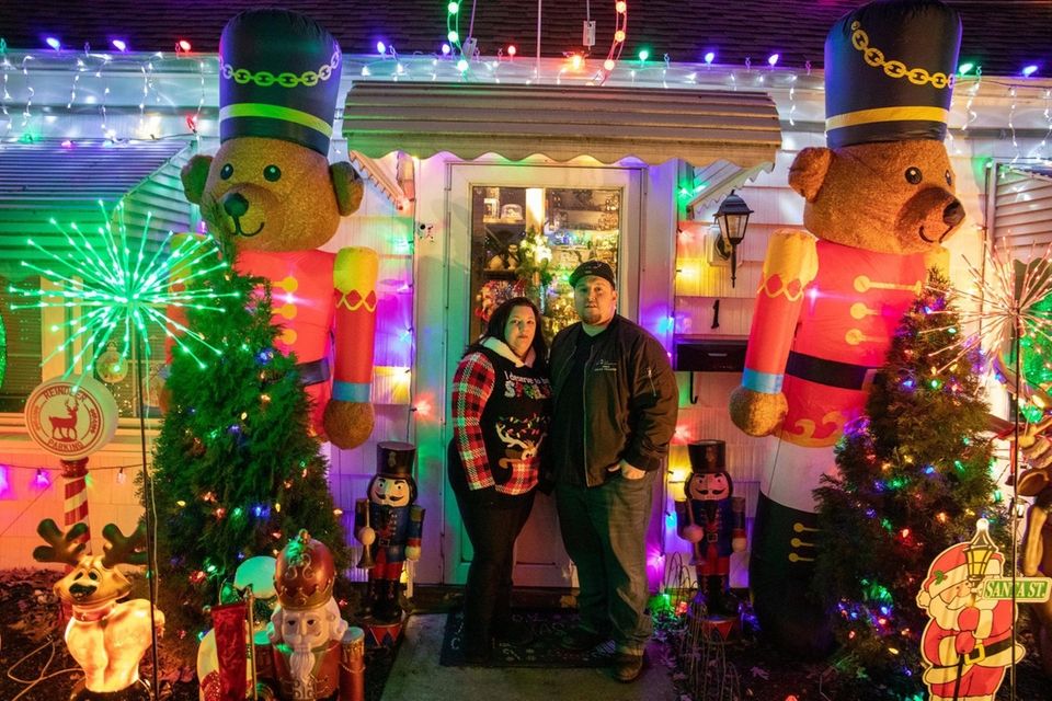 Michael Troy and Nicole Troy showcasing their holiday