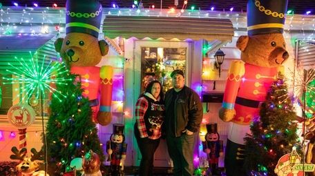 Michael Troy and Nicole Troy showcasing their holiday