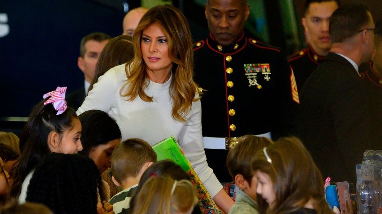 First lady Melania Trump gives out toys on