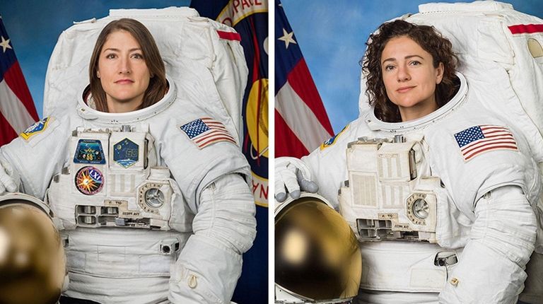 Astronauts Christina Koch and Jessica Meir posing for