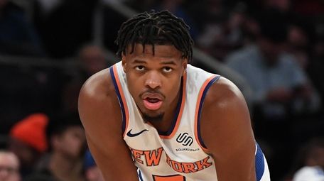 Knicks guard Dennis Smith Jr. looks on against