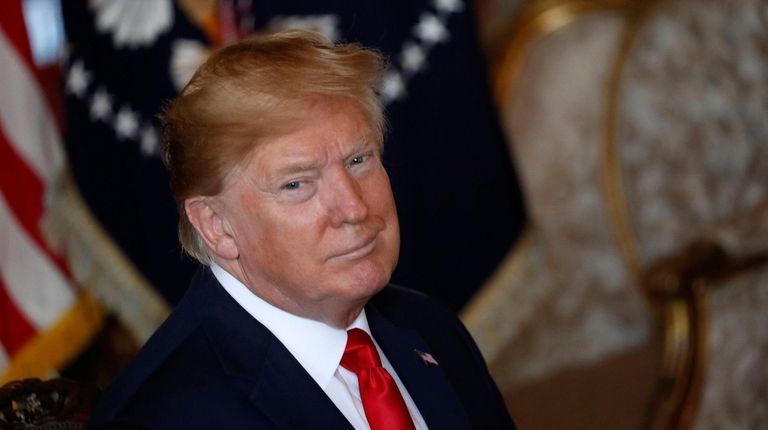 President Donald Trump attends a Christmas Eve video