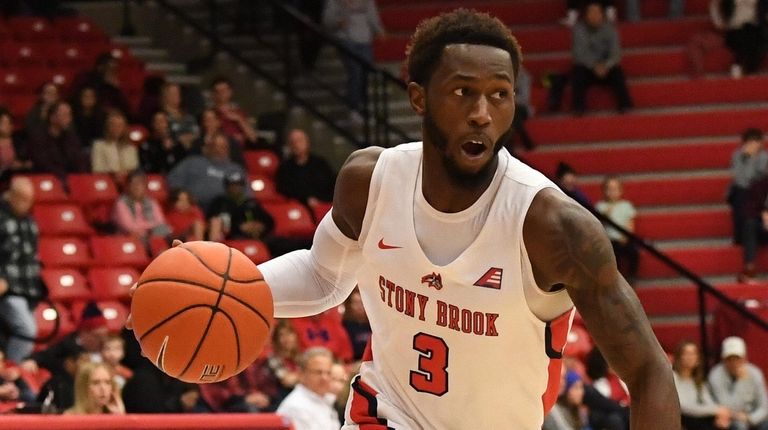 Stony Brook guard Elijah Olaniyi drives the ball