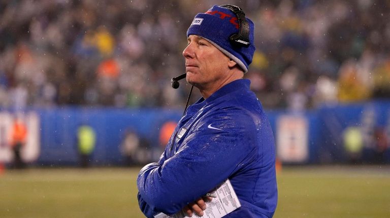 Giants head coach Pat Shurmur looks on from