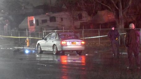 Suffolk County police at scene where a bicyclist