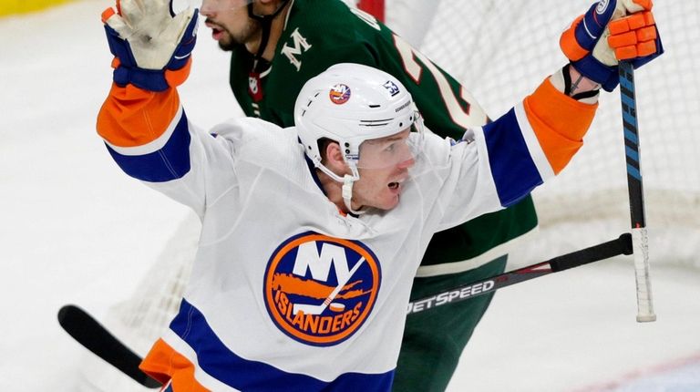 The Islanders' Casey Cizikas celebrates a goal as