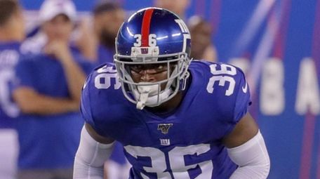Giants defensive back Sean Chandler lines up during