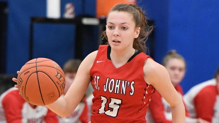St. John the Baptist's Cara McCormack dribbles the