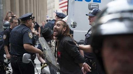 Police arrest supporters of the Occupy Wall Street