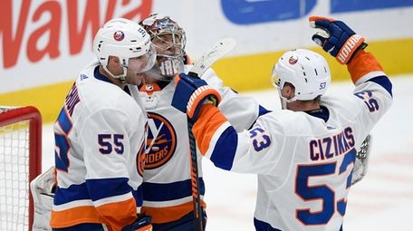 Islanders center Casey Cizikas, defenseman Johnny Boychuk and