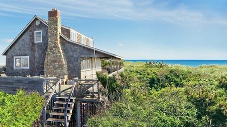 Built in 1950, Robbins' two-story home boasts wraparound
