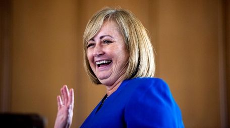 Karen McInnis is sworn in to the Long