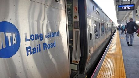 Commuters at the Hicksville LIRR Train Station make