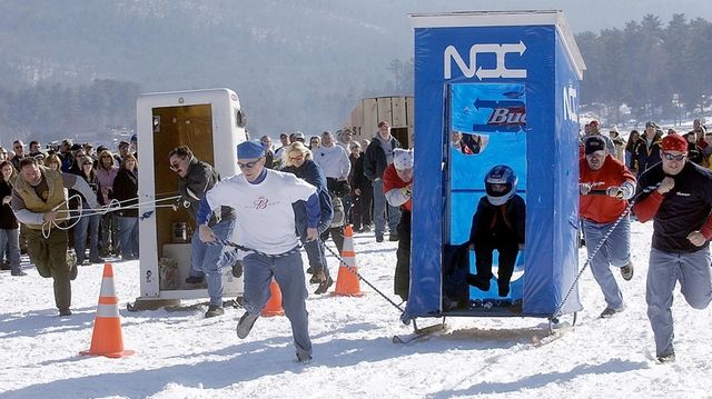 The team from Northern Distributor, right, wins a
