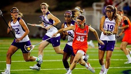 Syracuse's Michelle Tumolo is surrounded by Northwestern's Lacey