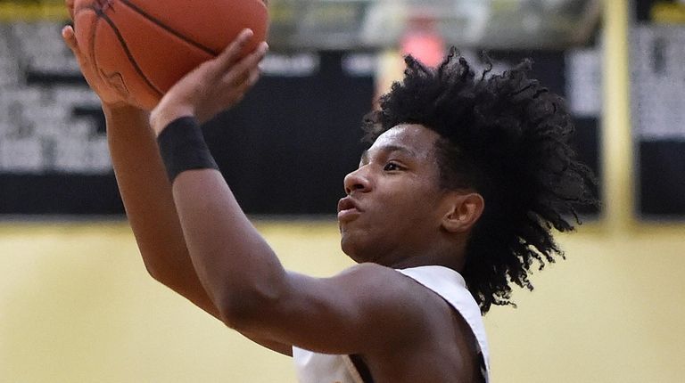 Jo Jo Wright #10, Uniondale freshman, shoots a