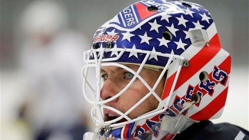 Martin Biron looks on during an informal NHL