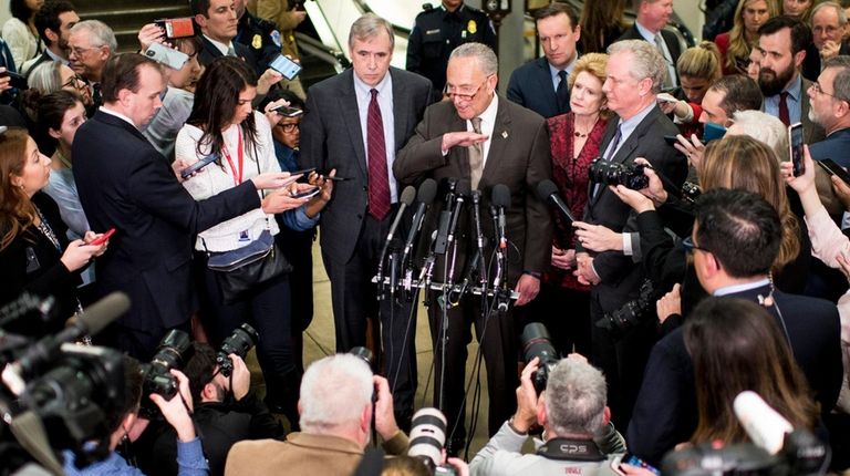 Senate Minority Leader Chuck Schumer speaks to the