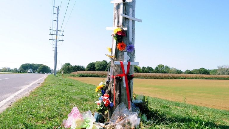 Makeshift memorial at the intersection of County Road
