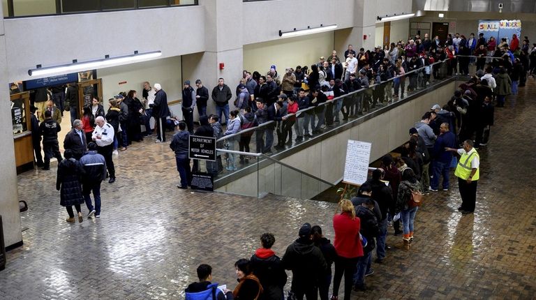A long line snakes around the lobby outside