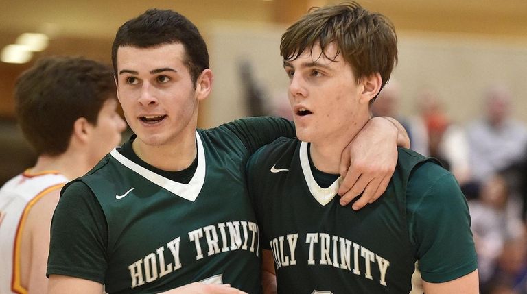 Mike Sixsmith of Holy Trinity, left, and TJ