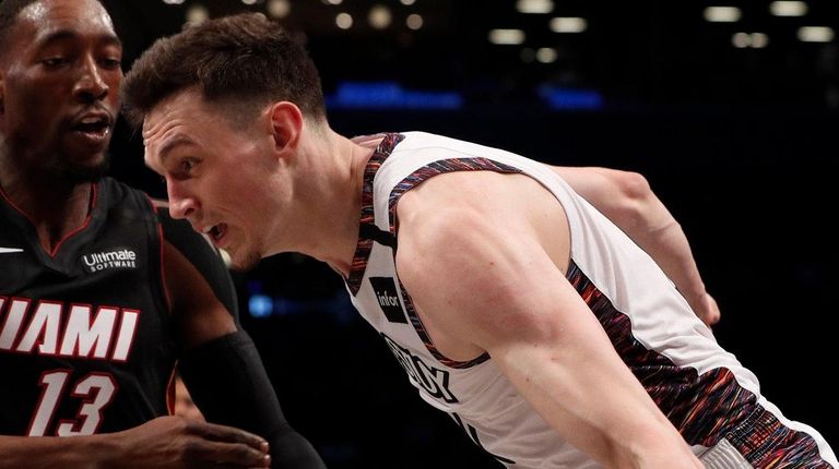 Rodions Kurucs of the Brooklyn Nets drives to
