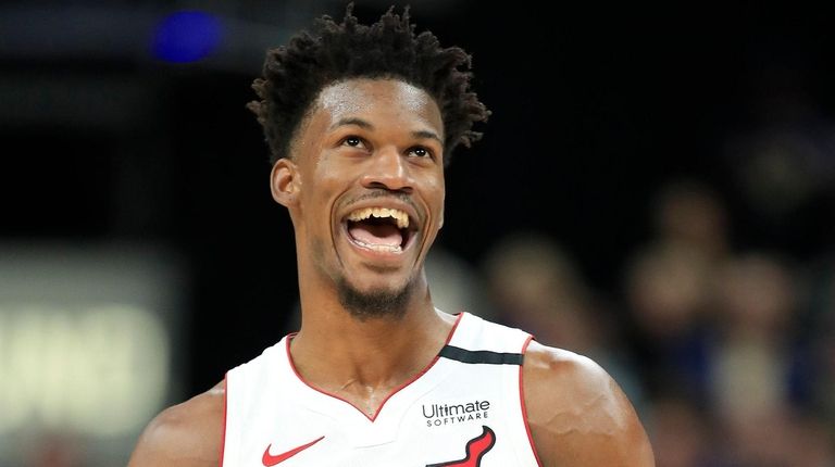 Jimmy Butler of the Miami Heat reacts after