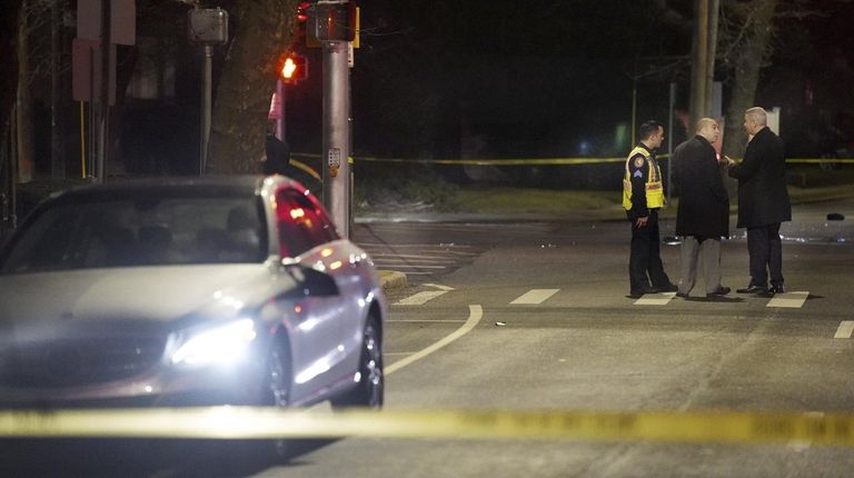 Investigators at the scene where Surgit Singh, 70,