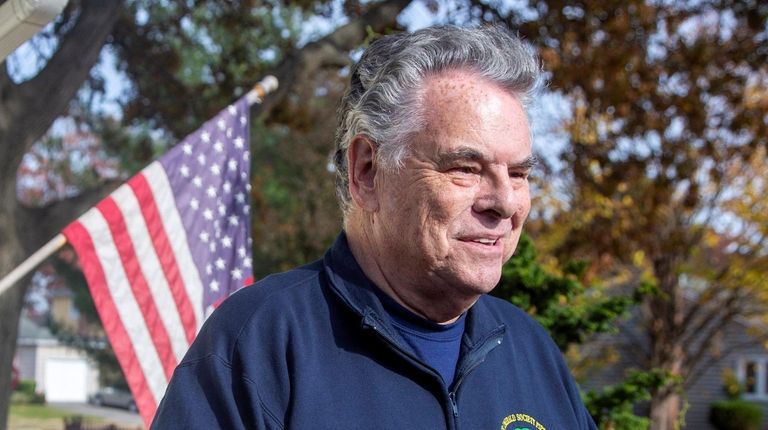 Rep. Peter King speaks outside his home in