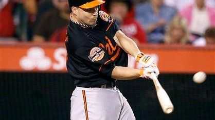 Baltimore Orioles' Steve Pearce hits a three-run home