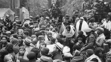 Refugees from the Spanish Civil War crowd the