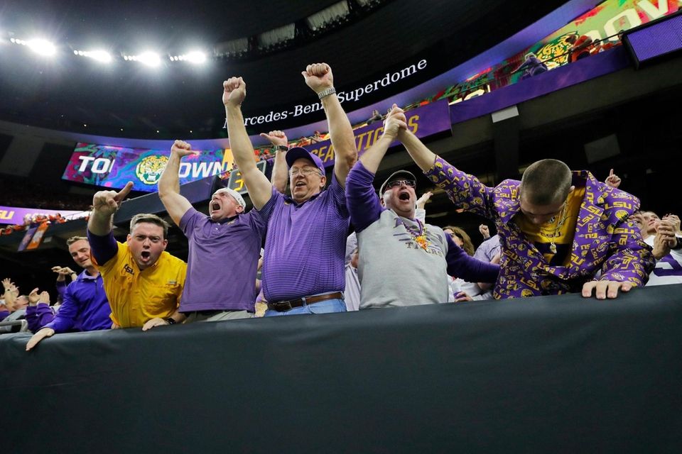 Fans celebrates after LSU wide receiver Ja'Marr Chase