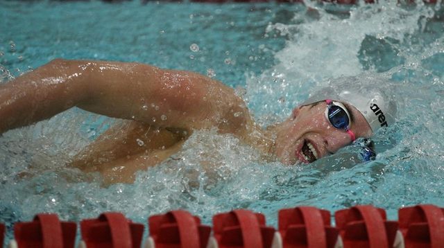 Syosset's Ari Regev pushes through the 500 yard