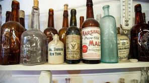 Long Island Antique Bottle Association co-chair Mark Smith