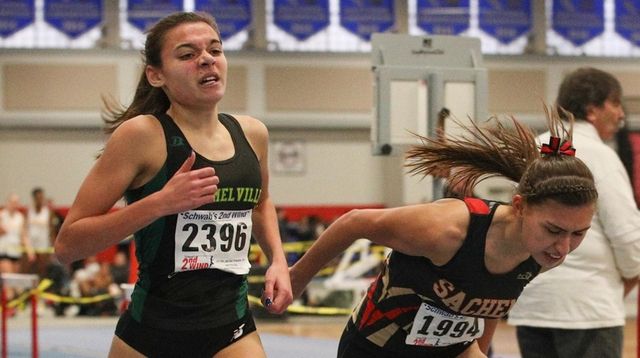 Briana Grant (2396) of Ward Melville crosses the
