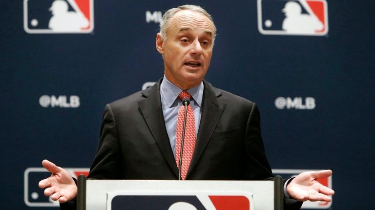 MLB commissioner Rob Manfred speaks to the media
