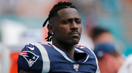 Former New England Patriot Antonio Brown looks on