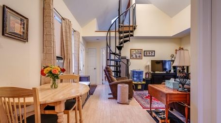 A metal spiral staircase in the living room