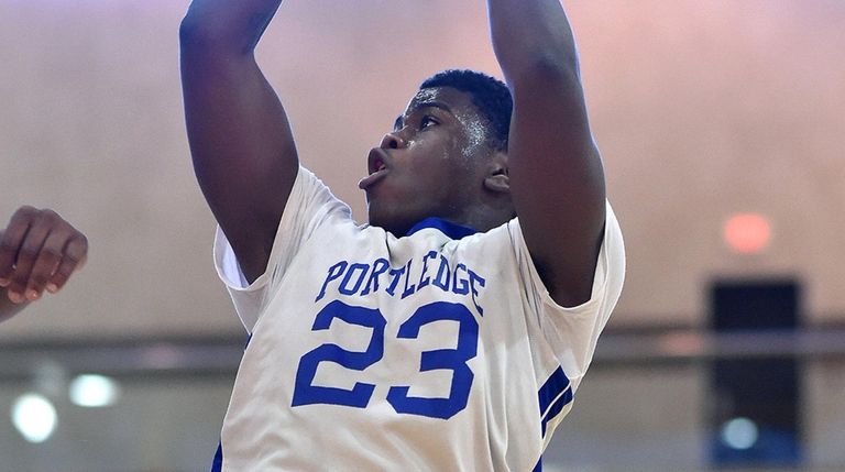 Zaire Baines of Portledge drives to the net