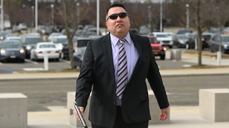 Former Massapequa High School teacher Joseph Zanco arrives